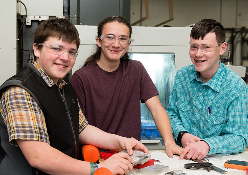 Students holding books